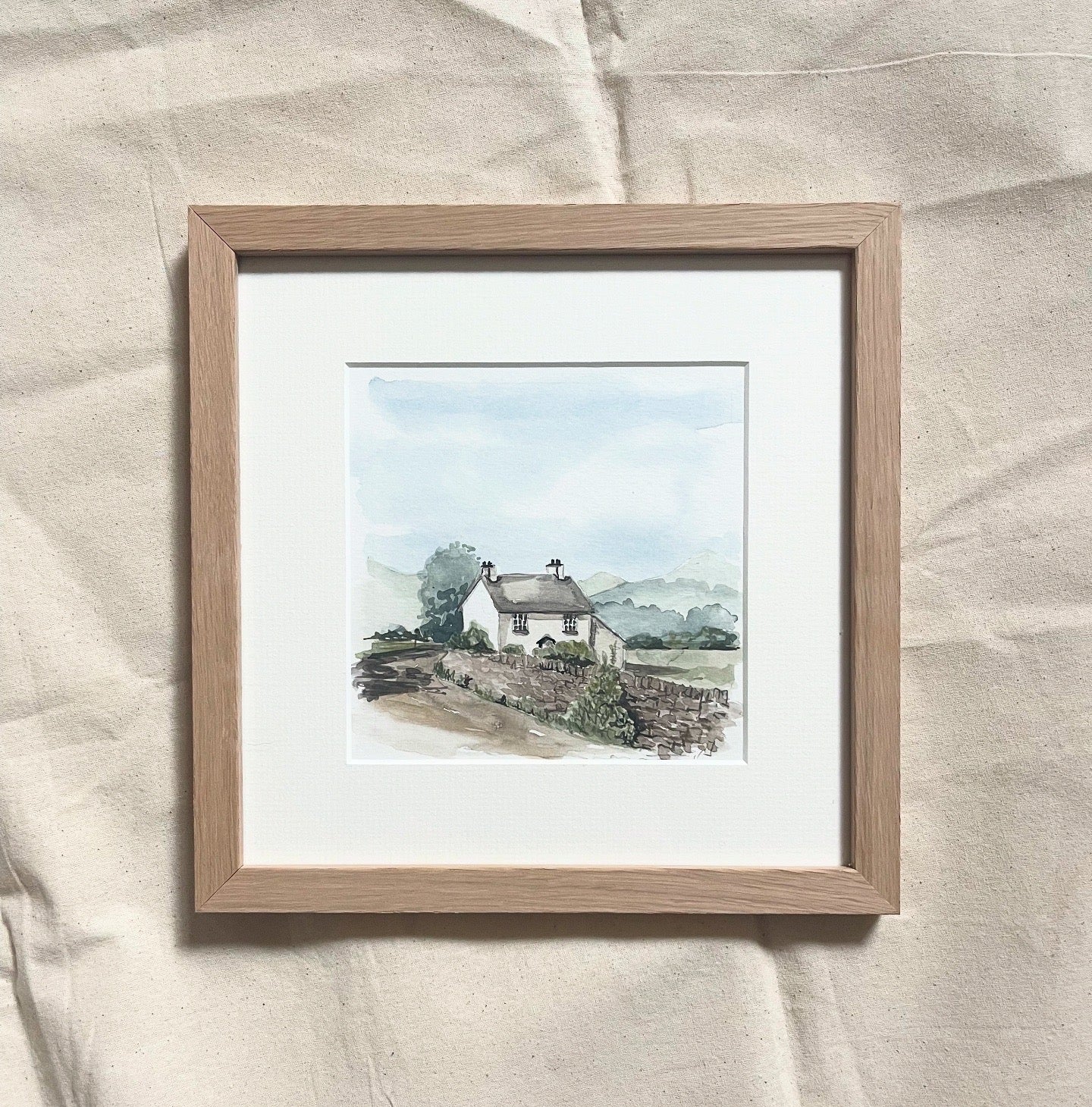 'White Cottage in the Lakes' Framed.