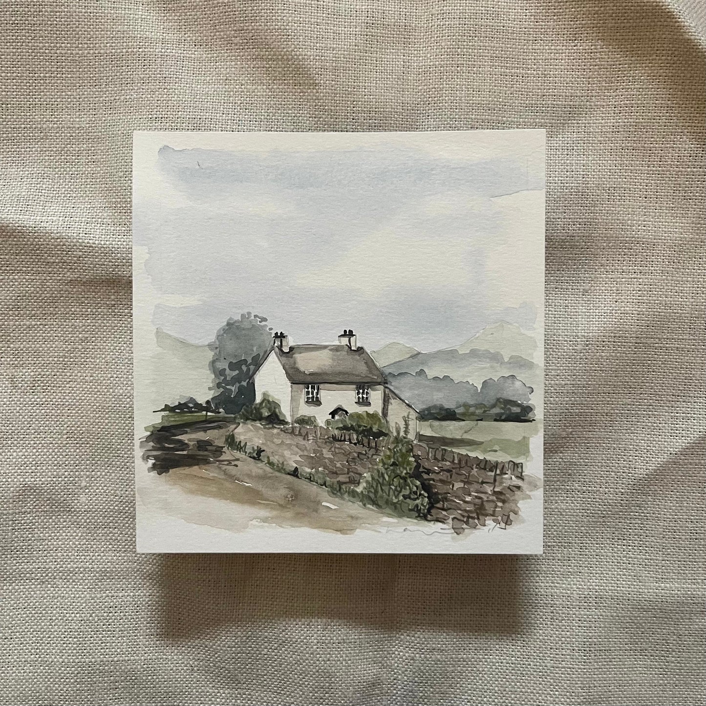 'White Cottage in the Lakes' Framed.